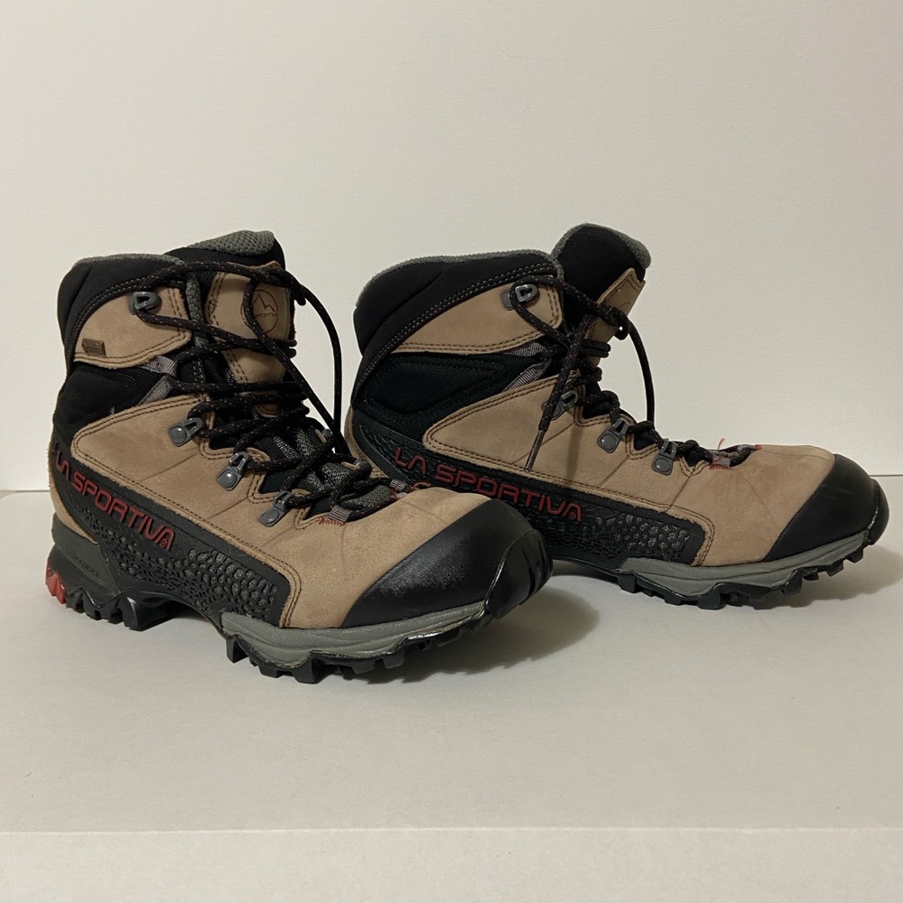 La Sportiva Tan and Black Winter Boots with Rugged Design